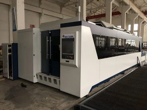 fiber laser metal cutting machine with protective enclosure and changer pallet